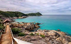 Njut av härliga dagar på ön Perhentian Kecil i Sydkinesiska Sjön